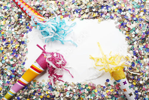 Background of confetti and over white background. Carnival, party, celebration. Copyspace. photo