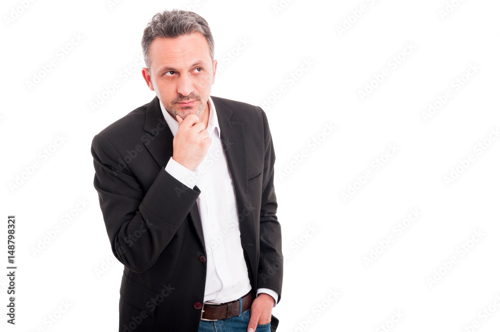 Attractive young man thinking at something Attractive young man thinking at something