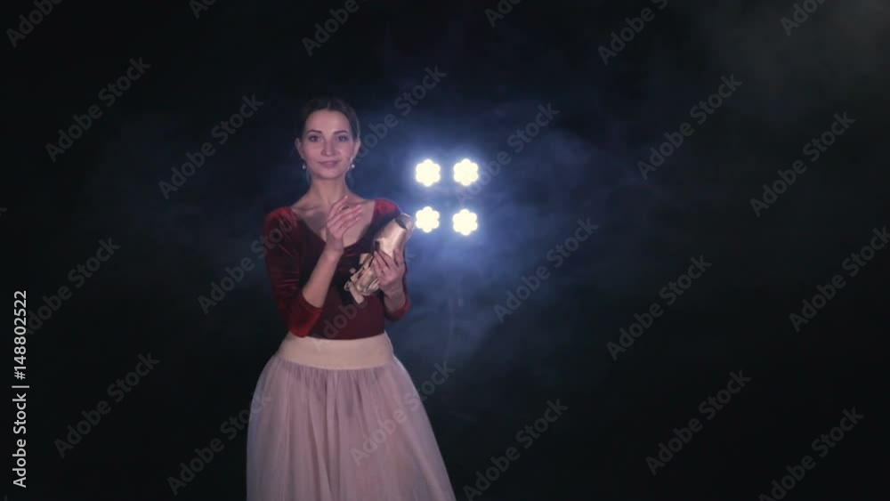 The portrait of the ballerina with pointe shoes. Close-up. HD. The portrait of the ballerina with pointe shoes. Close-up. HD.