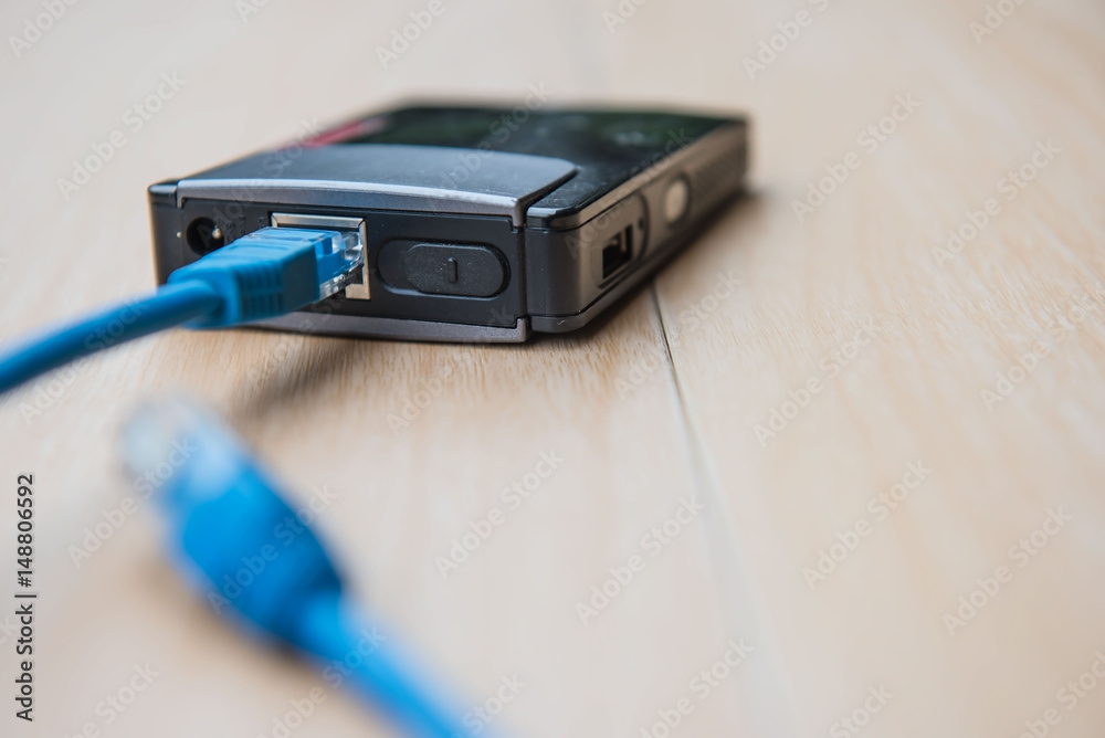 cable plug connector lan cable input the router technology concept. cable plug connector lan cable input the router technology concept.
