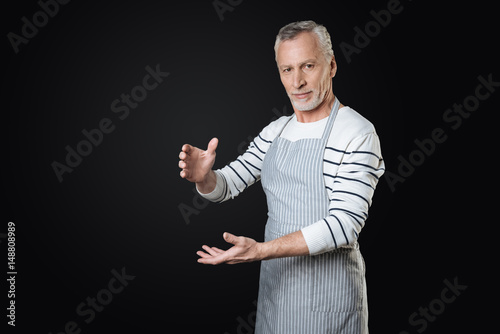 Angry man holding fictitious bottle