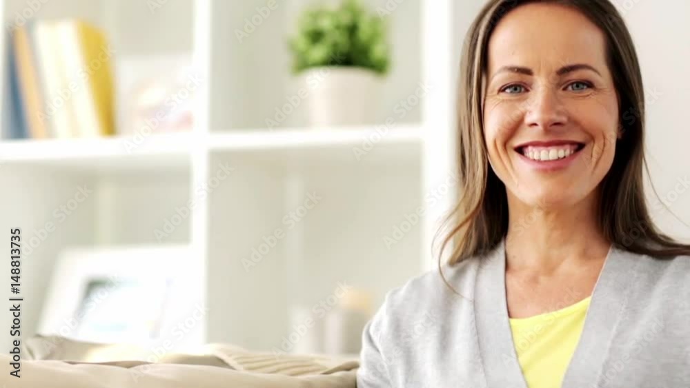 happy smiling middle aged woman at home happy smiling middle aged woman at home
