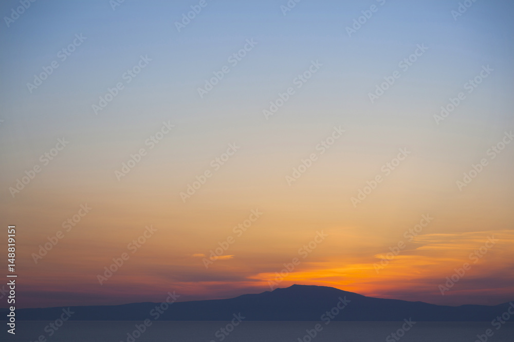 colorful sunset over messenia in greece on clear evening in spring