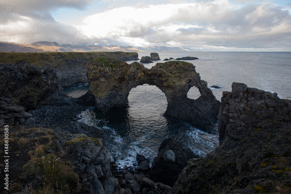 Tough nature at a cliff in Iceland. Rocky mountains and beautiful ...