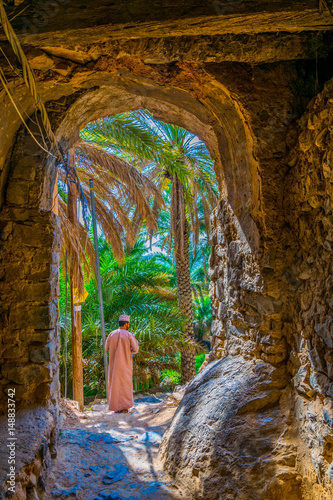 View of a narrow street of the Misfat al abriyeen village in Oman. photo