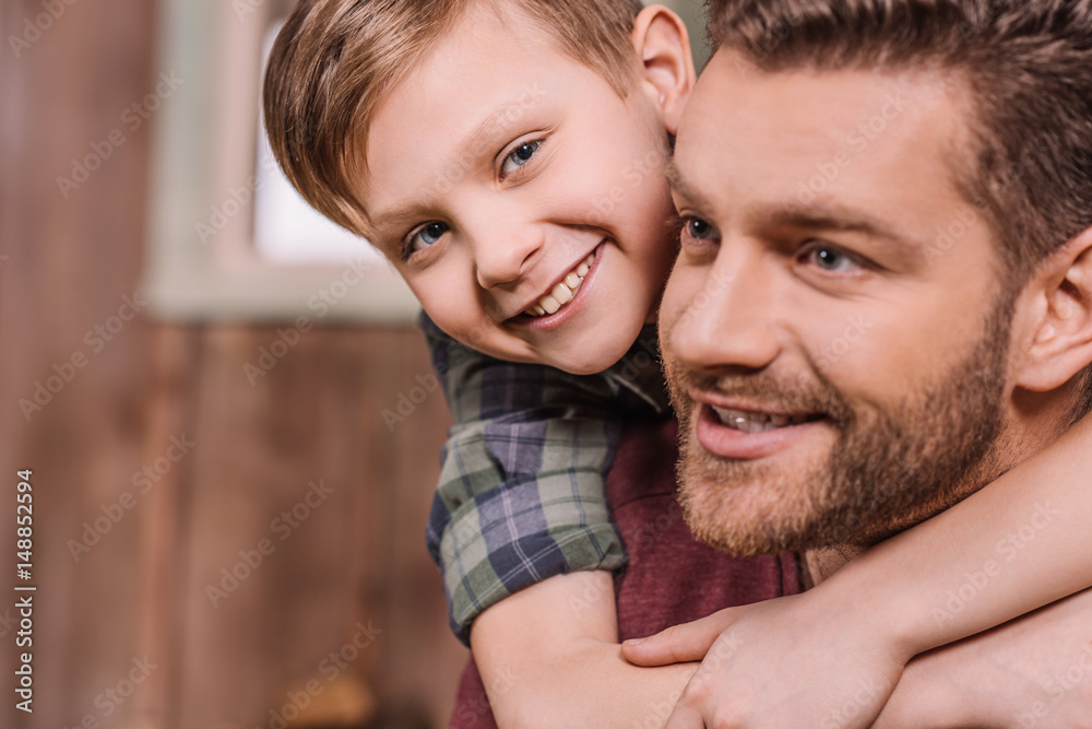 young father with little son sitting on porch at backyard, dad and son playing young father with little son sitting on porch at backyard, dad and son playing