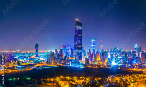 Night aerial view of the downtown Kuwait dominated by the liberation tower. photo
