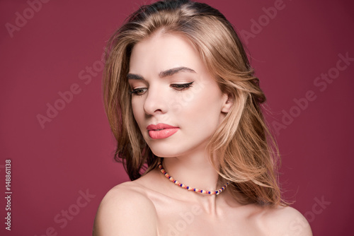 close up portrait of young stylish beautiful woman with makeup, young woman face