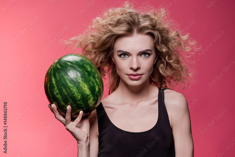 portrait of woman holding fresh watermelon isolated on pink portrait of woman holding fresh watermelon isolated on pink