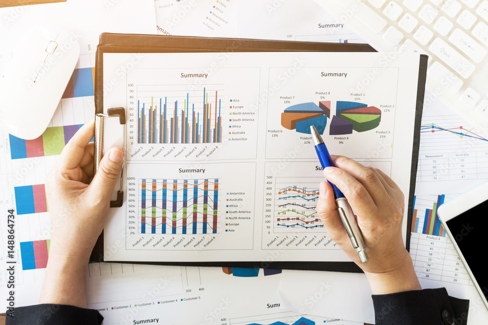 Business woman working at office with documents Business woman working at office with documents