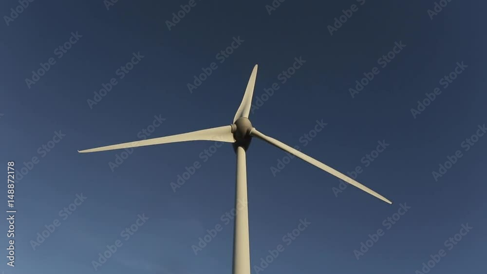 Wind turbines of a power plant for electricity generation in Normandy, France. Concept of renewable sources of energy. Environmentally friendly electricity production Wind turbines of a power plant for electricity generation in Normandy, France. Concept of renewable sources of energy. Environmentally friendly electricity production
