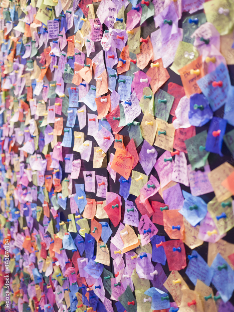 Wishes posted on a wall.