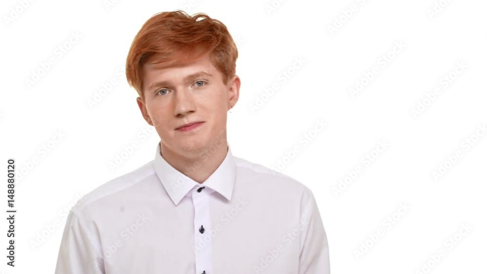 Young redhead Caucasian man standing scared on white background Young redhead Caucasian man standing scared on white background