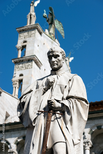 Lucca - Statue of Francesco Burlamacchi and the church of San Michele in Foro. Tuscany, Italy photo