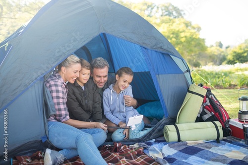Family taking a selfie in the tent © wavebreak3