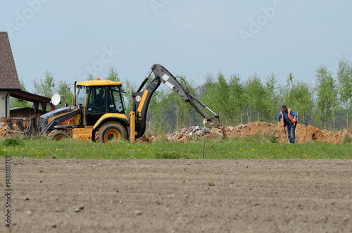 Obraz na płótnie Excavator performing ground works w salonie