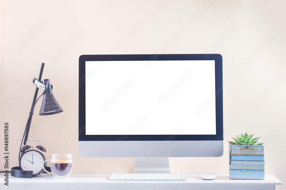 Fototapeta premium Work desk with computer, copy space on blank screen