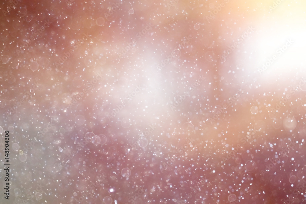 Fototapeta premium Snowfall texture of snowflakes on blurred background