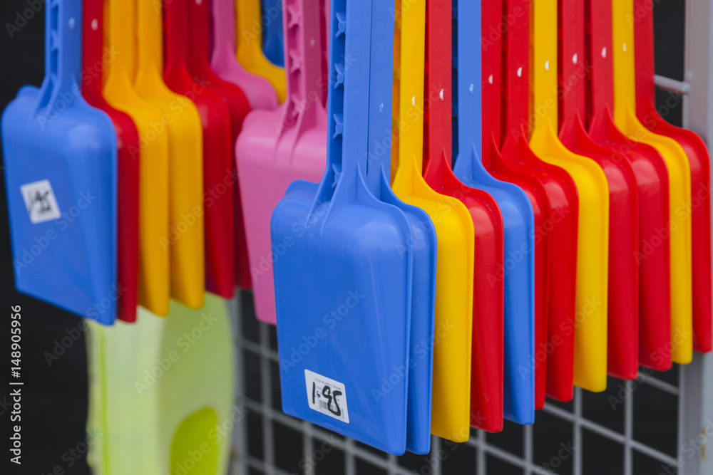 Fototapeta premium Plastic spades for sale.