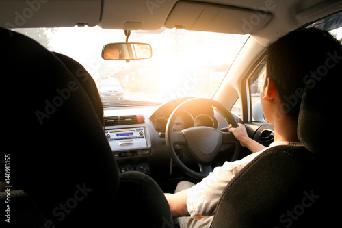 Driving man drive car to trip travel on the road. © thongchainak