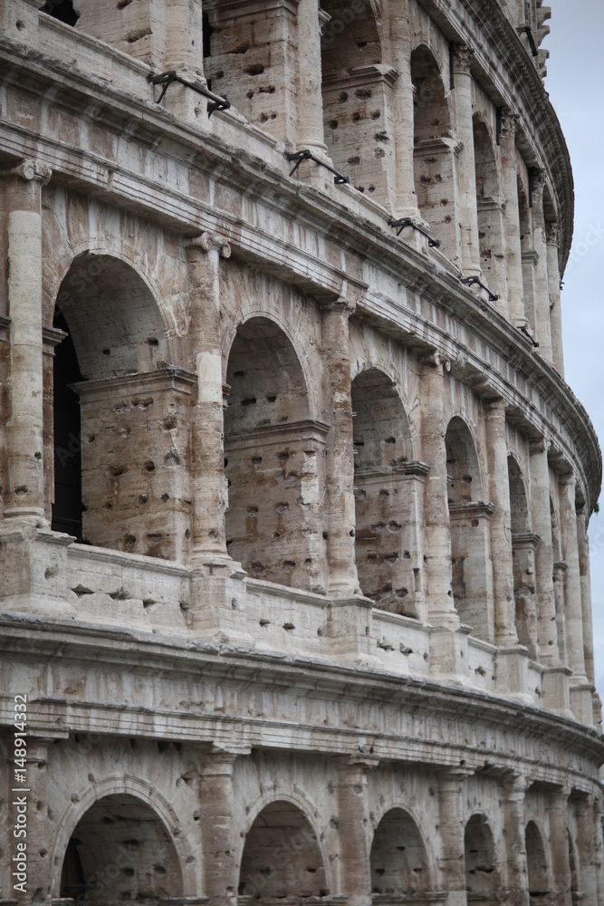 Fototapeta premium Fragment of the wall of the ancient Colosseum. Rome, Italy