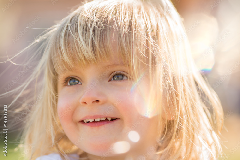 happy smiling young baby caucasian blonde real people girl close outdoor portrait happy smiling young baby caucasian blonde real people girl close outdoor portrait