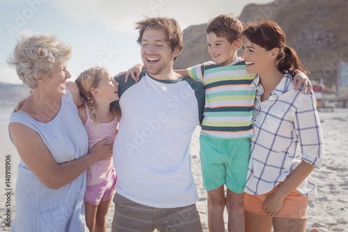 Happy multi-generated family at beach