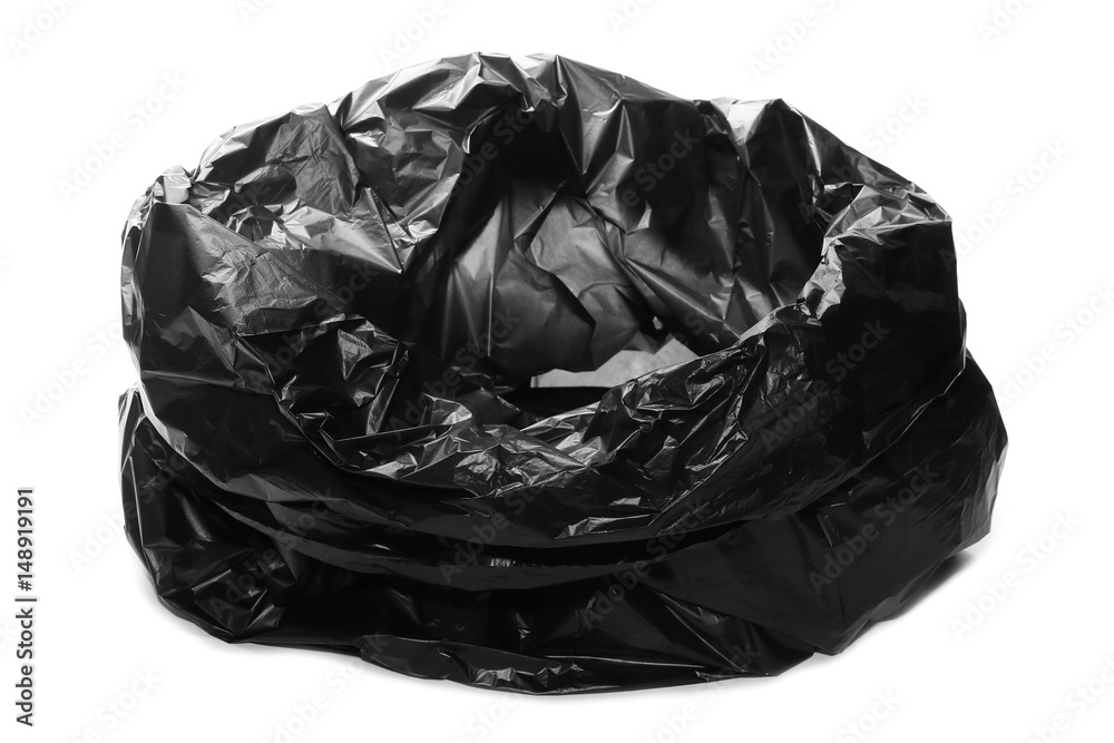 Crumpled, open black plastic garbage bag, isolated on white background Crumpled, open black plastic garbage bag, isolated on white background
