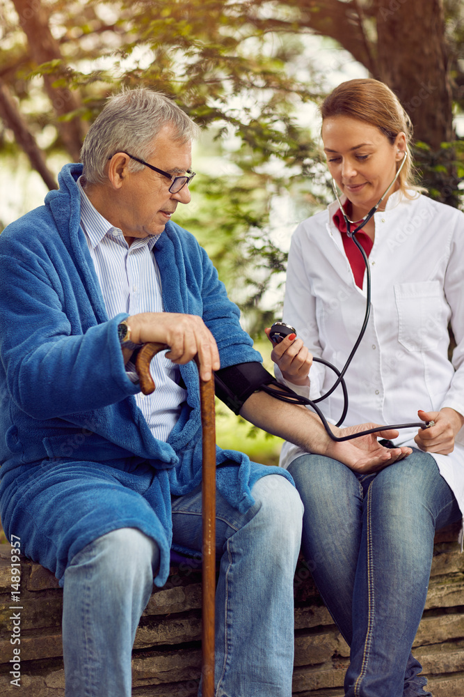 Hospitals, Labs and Clinics- assessment of blood pressure elderly man. Hospitals, Labs and Clinics- assessment of blood pressure elderly man.