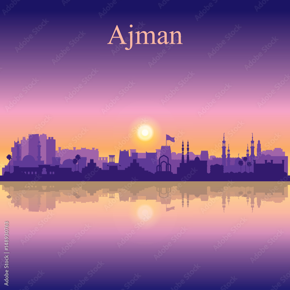Ajman silhouette on sunset background