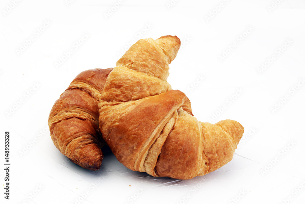 croissant on white board croissant on white board