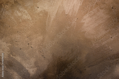 Metallic golden block tile with bolts floor reflecting bright light. Industrial abstract background concept