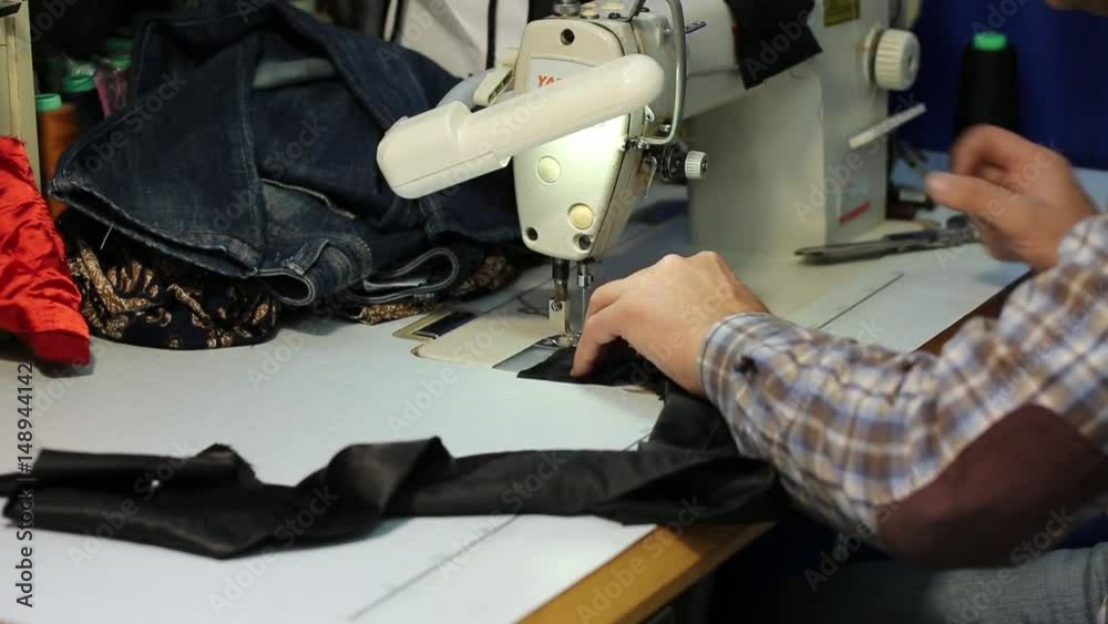 Tailor work progress. Dress-designer at work Tailor work progress. Dress-designer at work