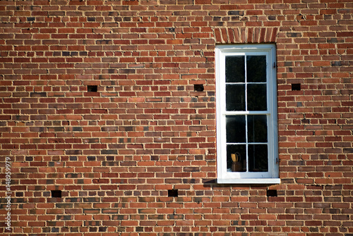 Old brick house with window