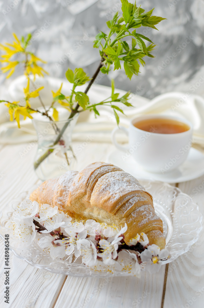 Fototapeta premium Croissant and cherry blossom