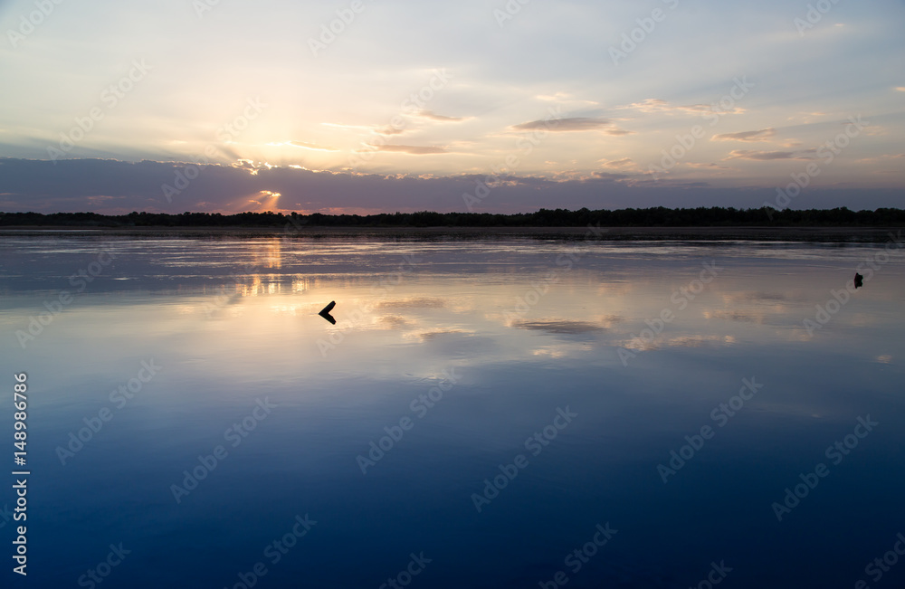 sunset on the lake as a backdrop