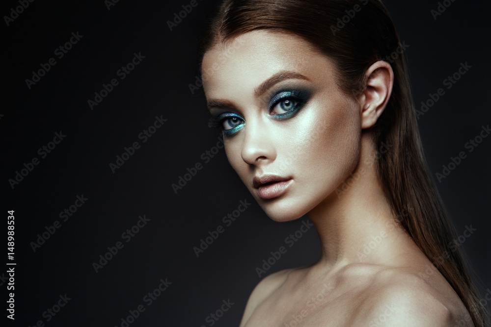 Fashion model Woman with fantasy make up. Long blowing brown hair. Fantasy Girl. Mermaid. Fashion model Woman with fantasy make up. Long blowing brown hair. Fantasy Girl. Mermaid.