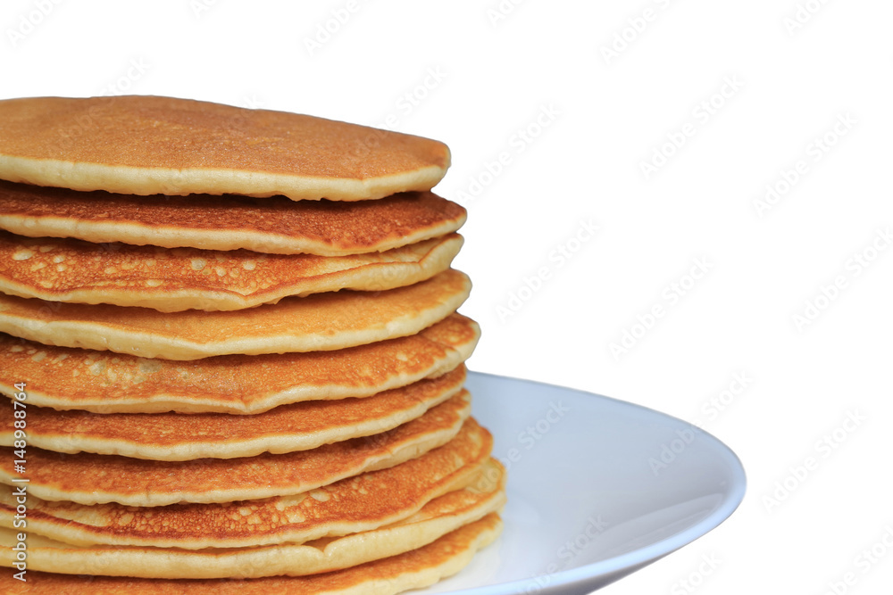 Closed up stack of fresh homemade plain pancakes served on plate, white background with free space for text or design Closed up stack of fresh homemade plain pancakes served on plate, white background with free space for text or design