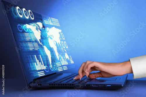 Vászonkép Touch screen graph on computer