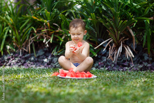 Little boy eat watermelon. Summer, food, picnic, outdoor.