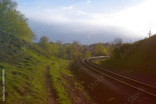 Railway among greenery of grass and trees, toned © isavira