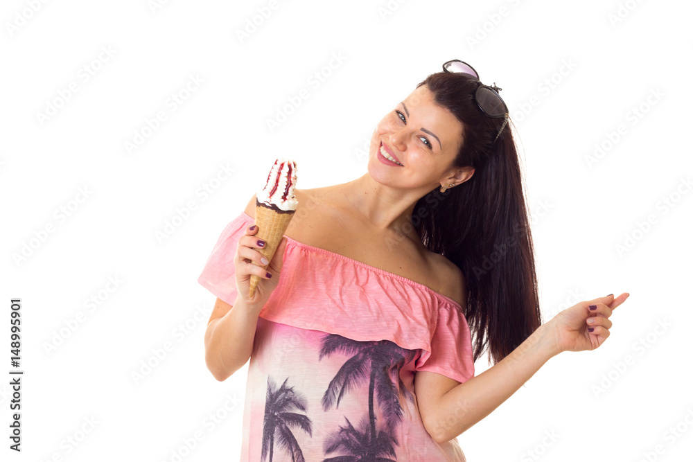 Woman in dress with sunglasses holding ice-cream Woman in dress with sunglasses holding ice-cream