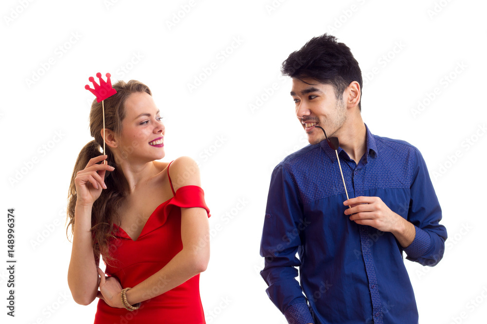 Young couple with cardboard sticks Young couple with cardboard sticks
