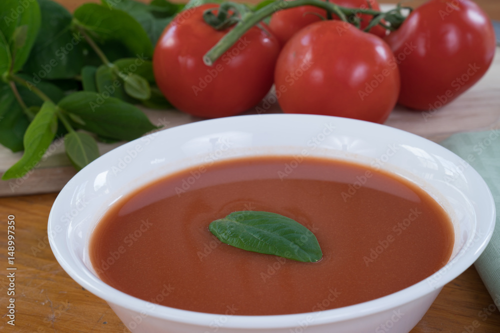 Tomato Soup on Table with Ingredients Tomato Soup on Table with Ingredients