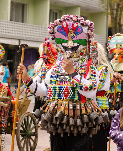 Varna Annual Spring Carnival parade. Kuker man with evil giant colorful mask photo