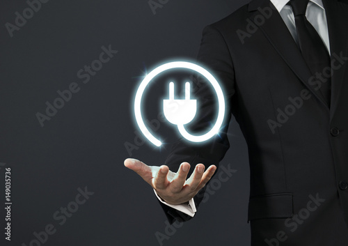Businessman magical touch concept - electric