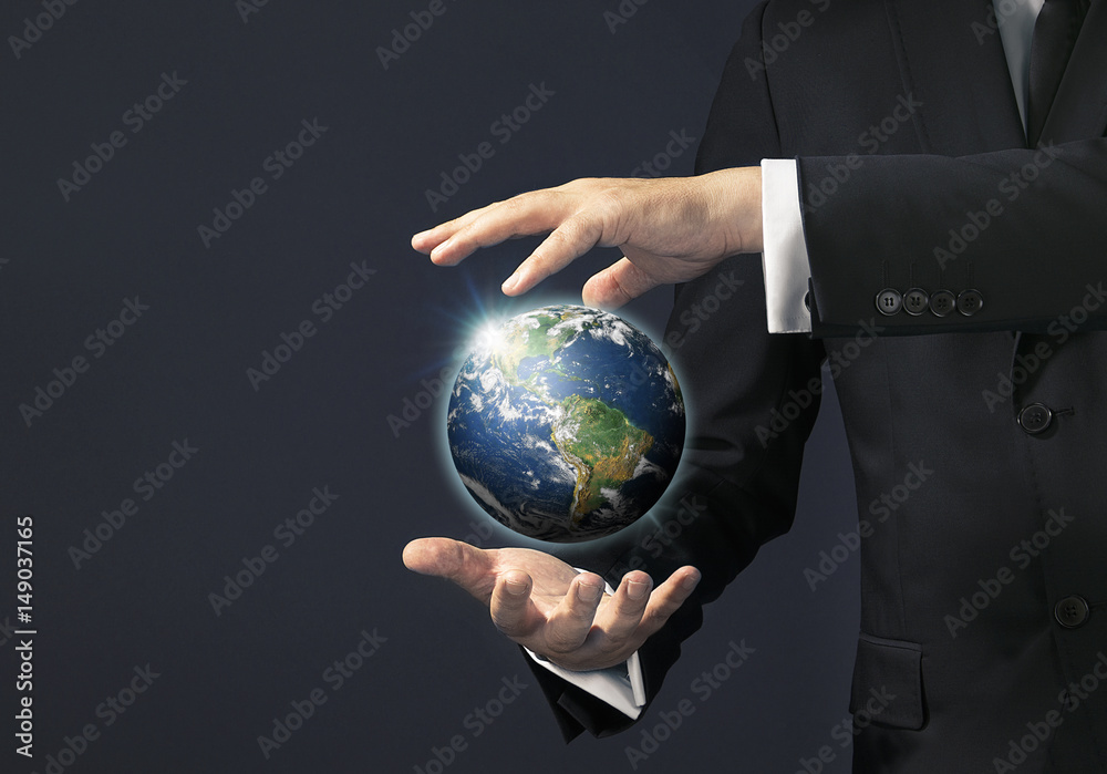 Businessman magical touch concept - world Businessman magical touch concept - world