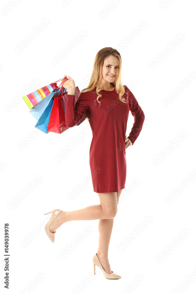 Beautiful woman with paper bags on white background Beautiful woman with paper bags on white background