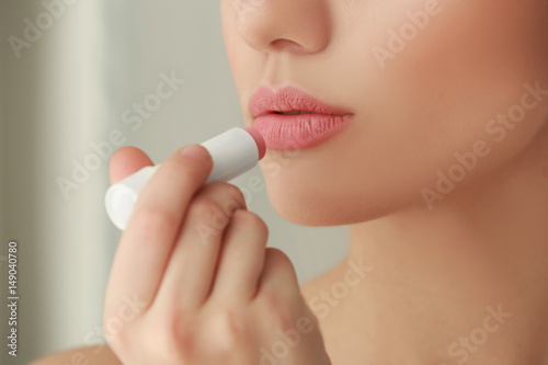Beautiful young woman with ...