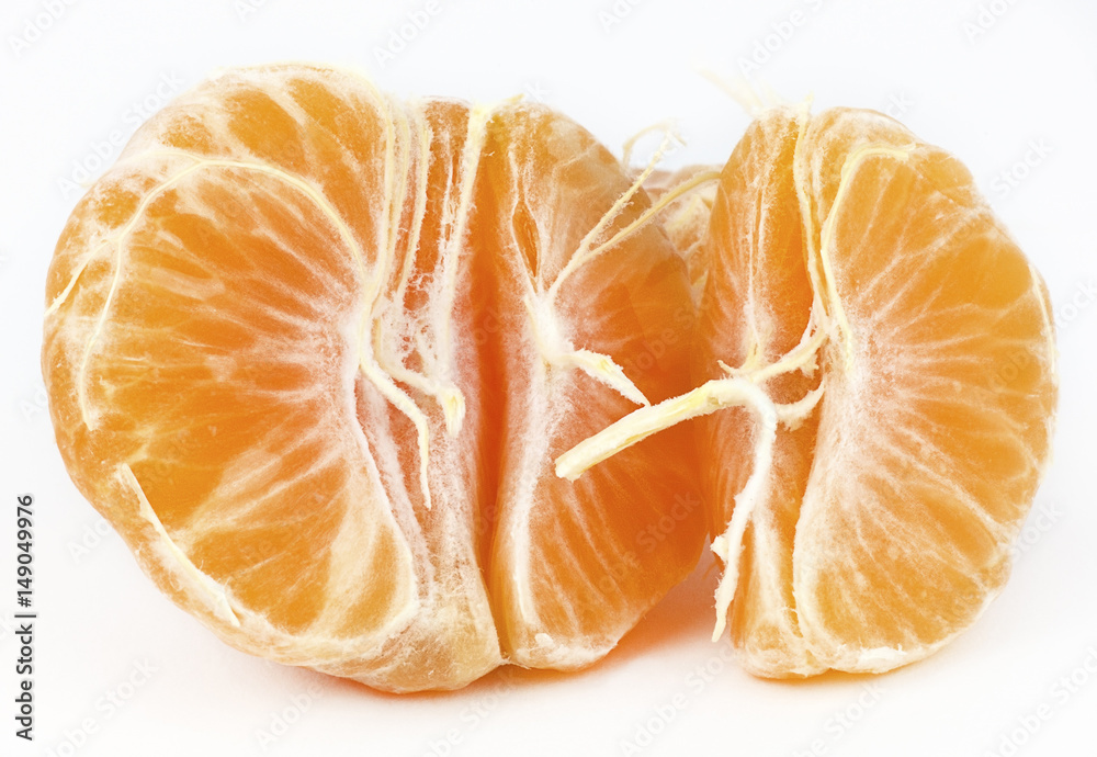 Peeled fresh clementine tangerine. Isolated. Peeled fresh clementine tangerine. Isolated.
